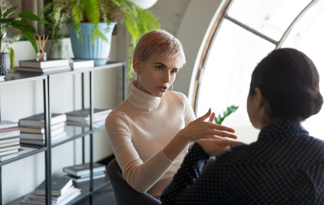 Two colleagues talking